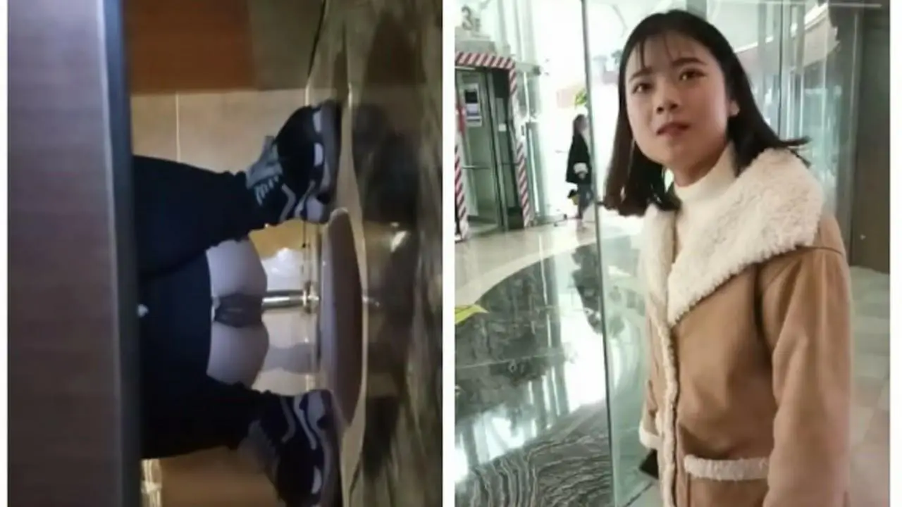某站流出大胆牛人潜入某大厦女厕偷窥出来故意搭讪妹子拍脸